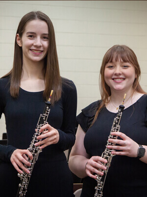 Students playing clarinet